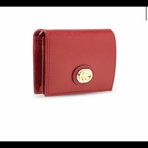 Gucci red gg tri-fold wallet in gold tone